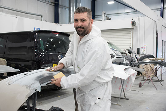 Commercial Photography including Car Modification by Mechanic.