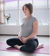 Commercial Photography including Female Yoga Class Attendee.