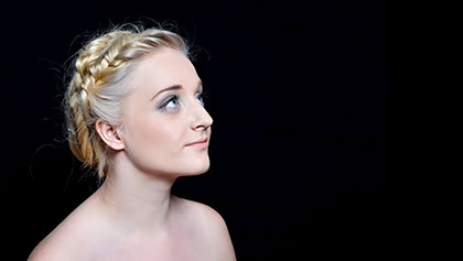 Commercial Photography including Female Model Portrait on Black Backdrop.